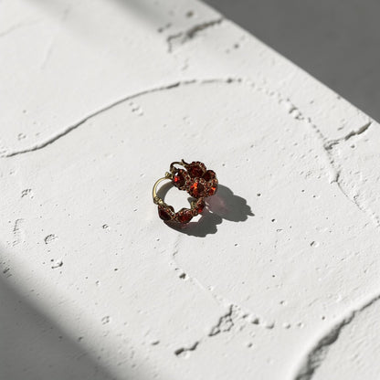 Red Crystal Pavé Huggie Hoop Earrings S925 Gold — angle highlighting drop and movement