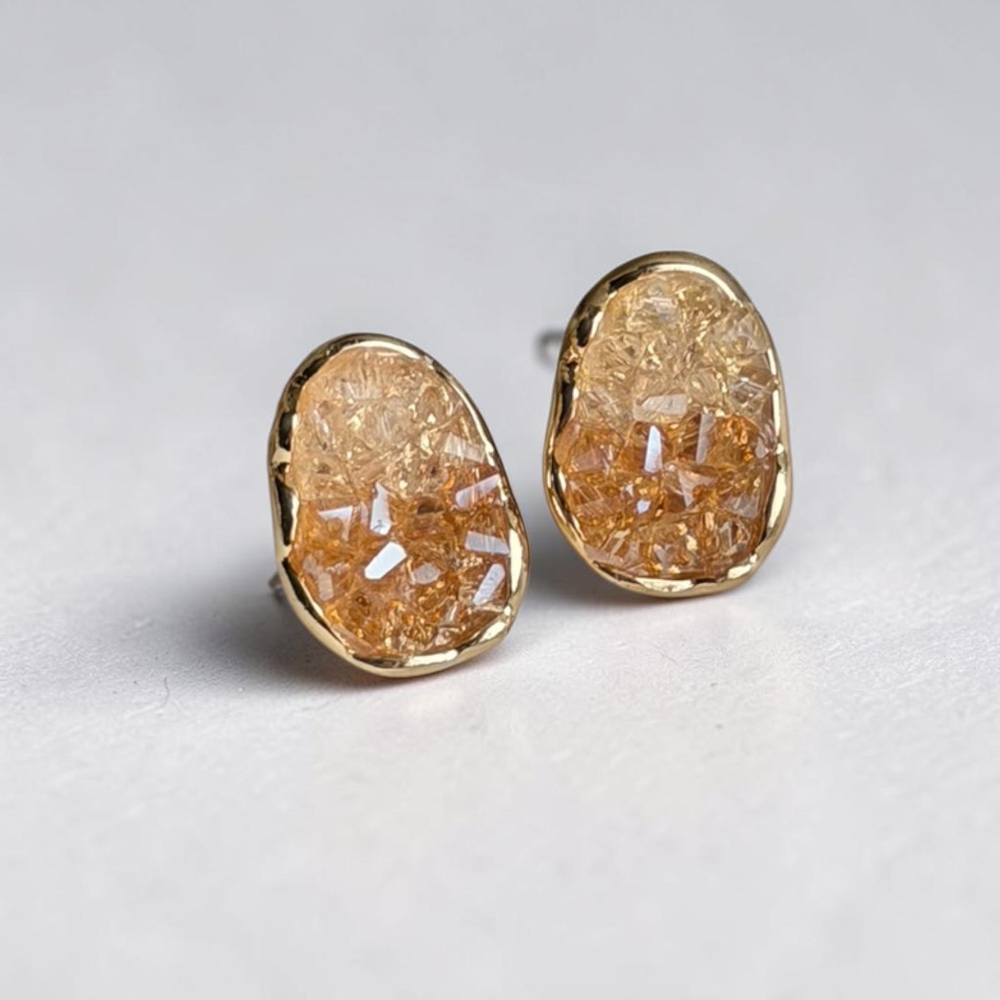 Amber Druzy Crystal Oval Stud Earrings S925 Gold — angle highlighting drop and movement