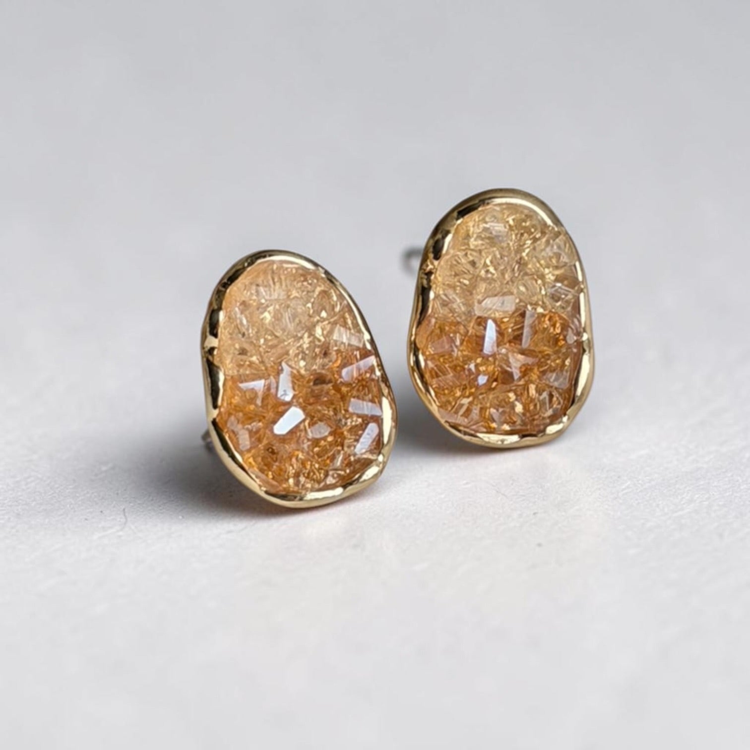 Amber Druzy Crystal Oval Stud Earrings S925 Gold — angle highlighting drop and movement