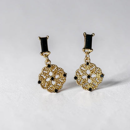 Gold Filigree Medallion Drop Earrings S925 Black — worn on model, side profile