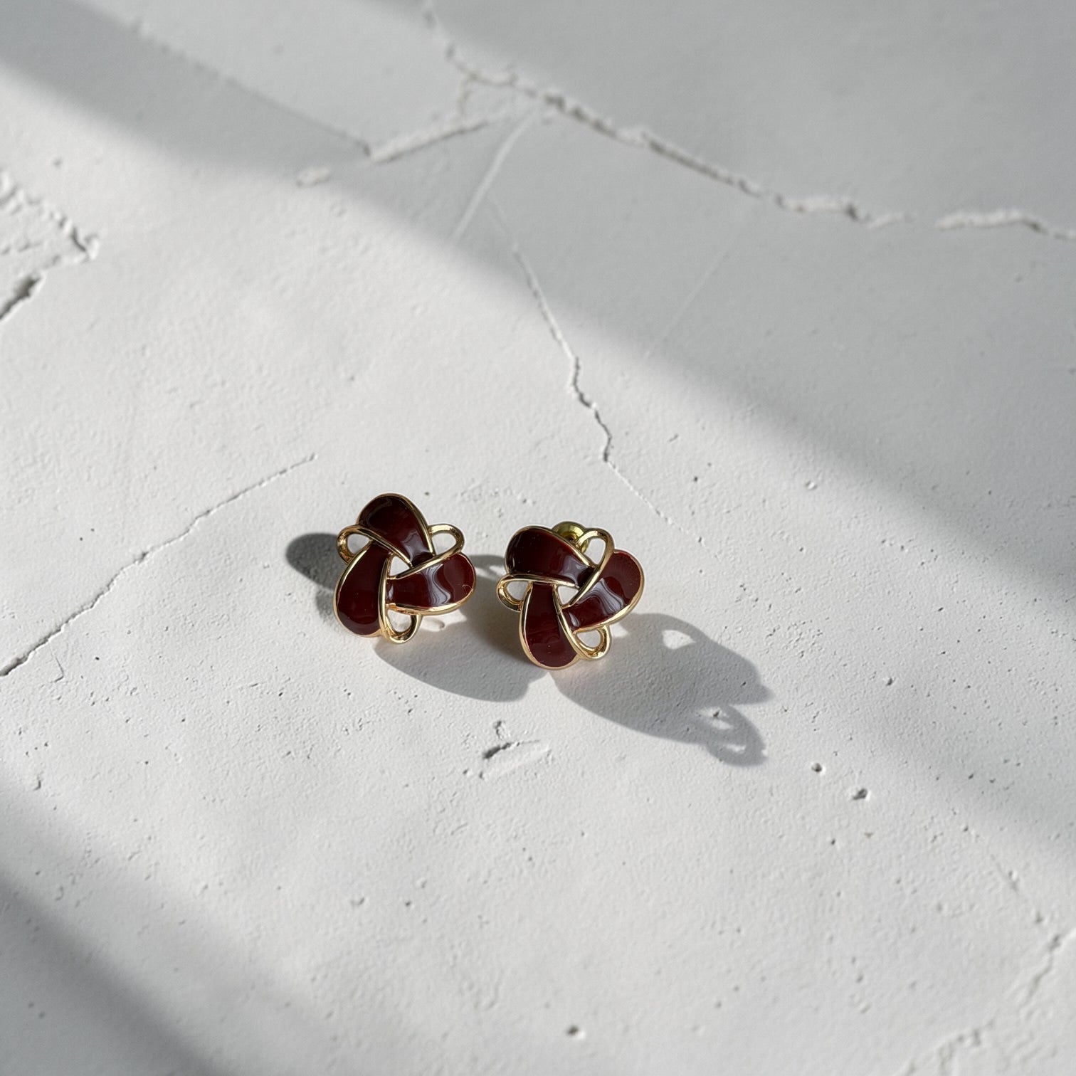 Burgundy Enamel Knot Stud Earrings S925 Gold Tone — pair shown together on flat lay