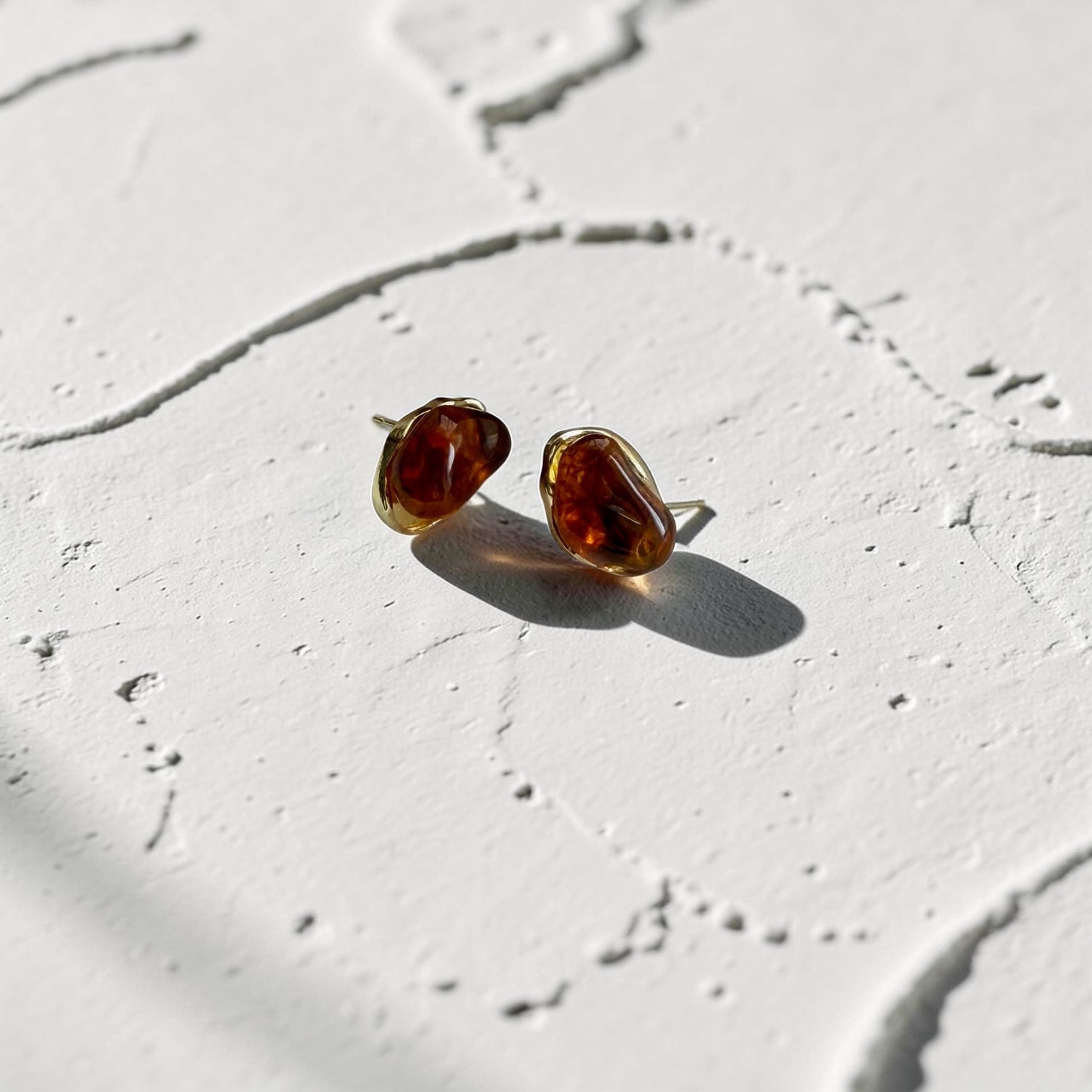 Organic Amber Resin Stud Earrings S925 Gold Wavy — pair shown together on flat lay