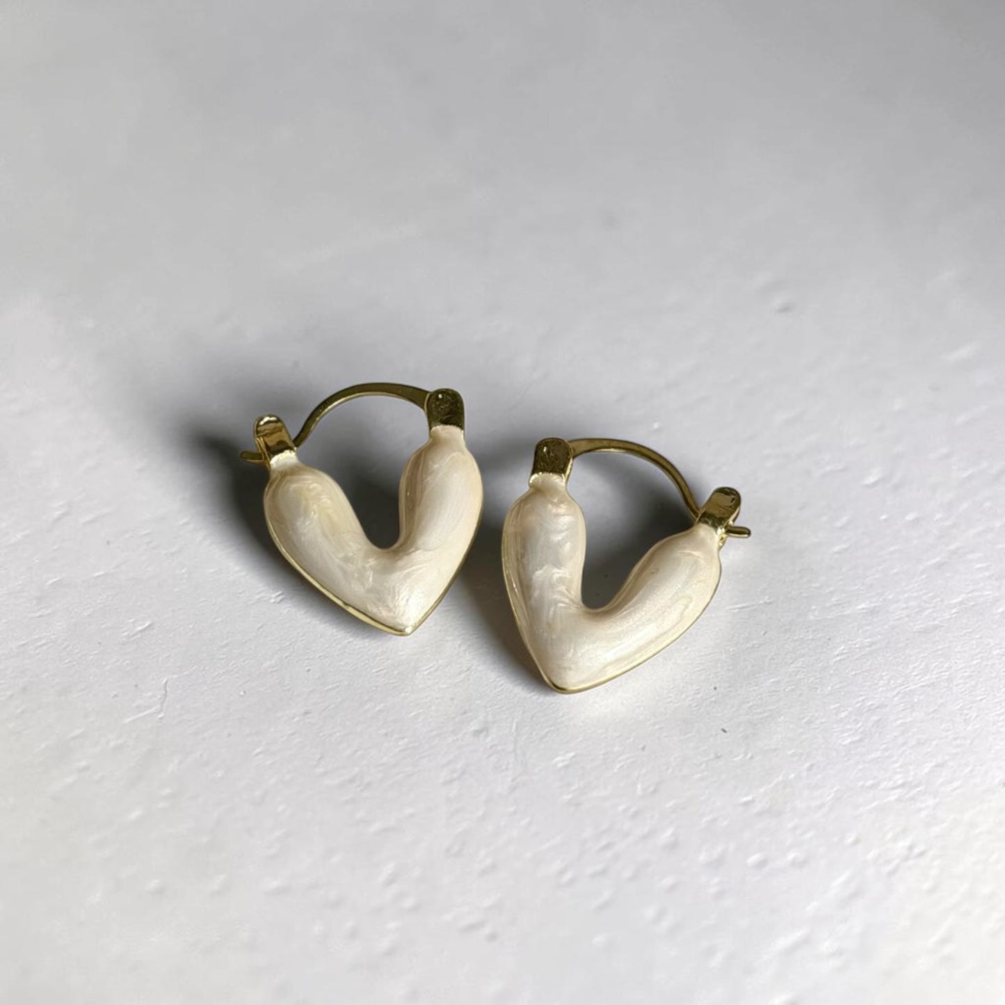 Cream Heart Drop Earrings Gold Romantic Women — angle highlighting drop and movement