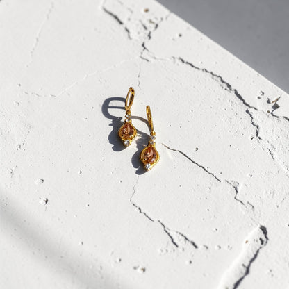 Peach Crystal Huggie Drop Earrings Gold Stainless — angle highlighting drop and movement