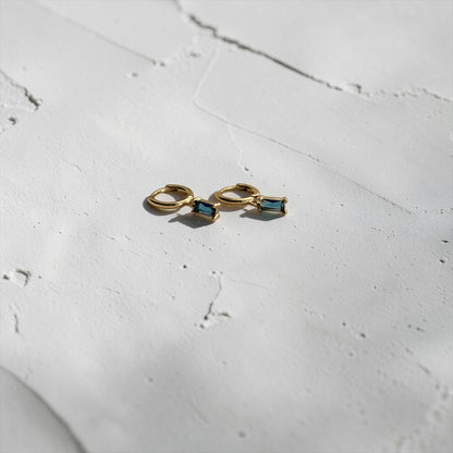 Baguette Blue Crystal Huggie Hoop Earrings 14K Gold — styled with neutral outfit