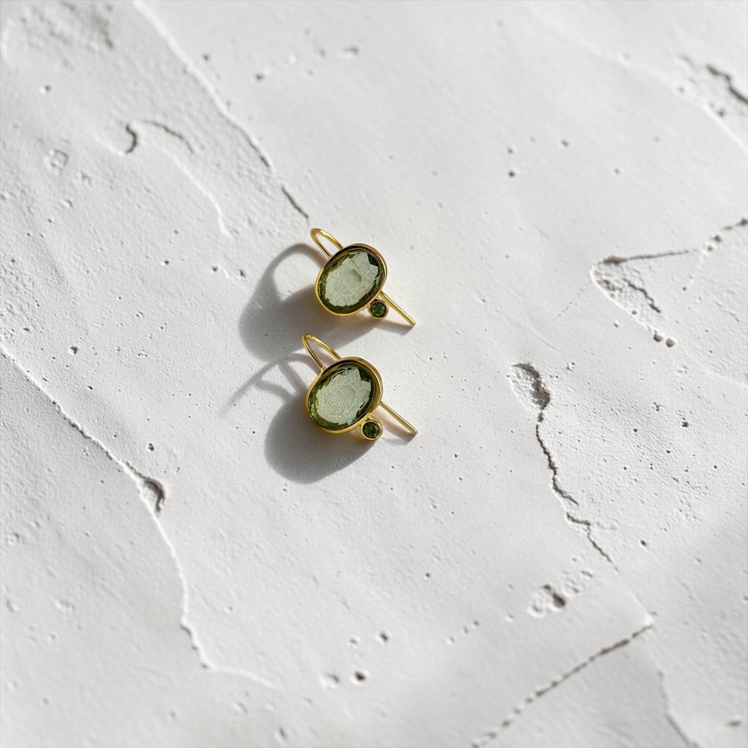 Grey Crystal & Green Accent Drop Earrings Gold — close-up of pearl and post detail
