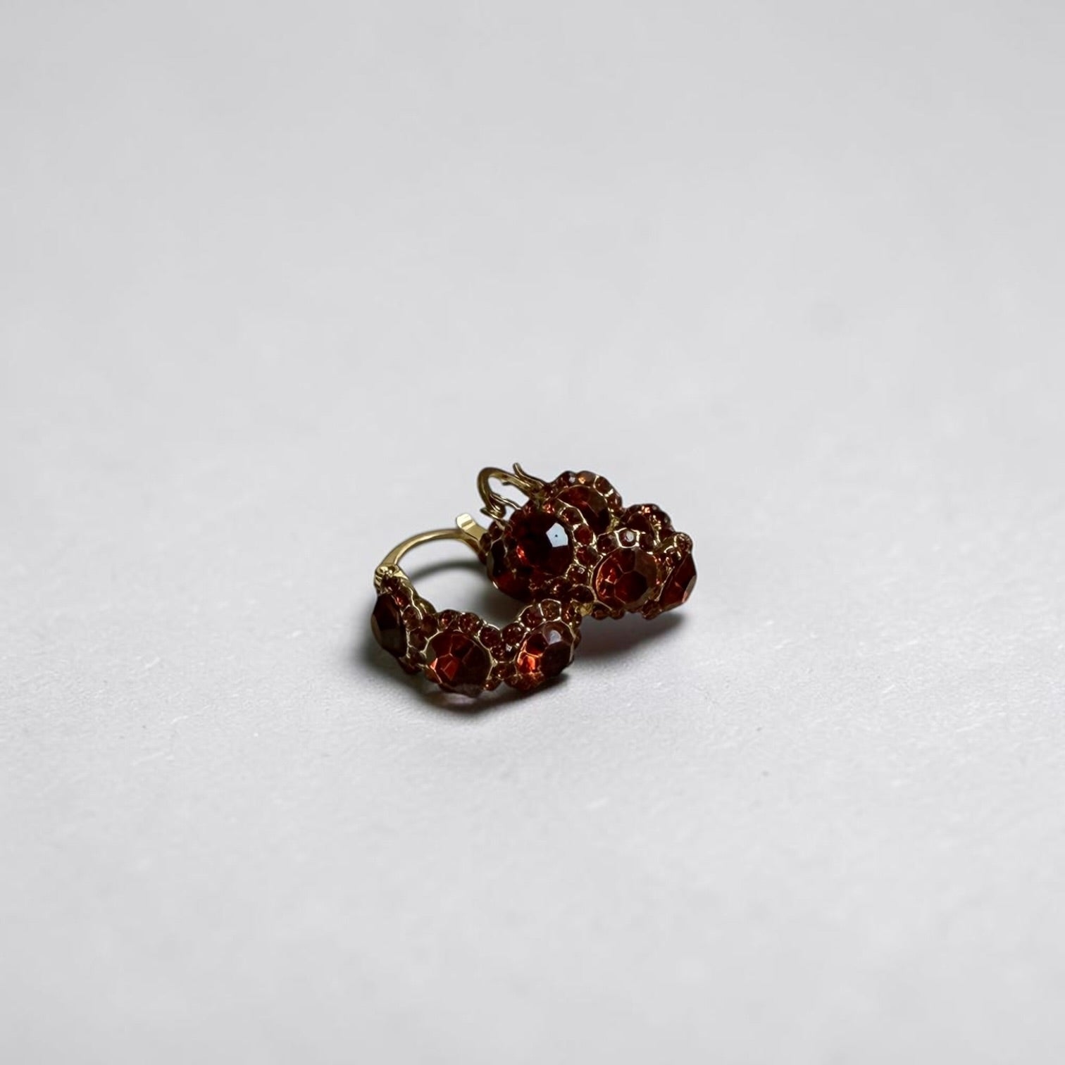 Red Crystal Pavé Huggie Hoop Earrings S925 Gold — styled with neutral outfit