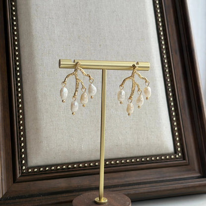 Natural Freshwater Pearl Stud Earrings S925 Gold — worn on model, side profile