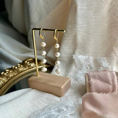 Natural Freshwater Pearl Stud Earrings S925 Silver on neutral background — front view