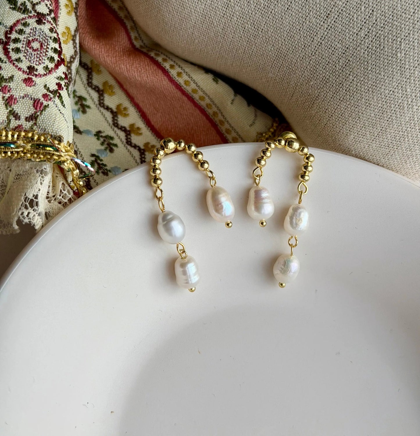 Freshwater Pearl Arch Stud Earrings S925 Silver — pair shown together on flat lay