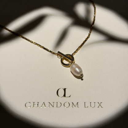 Baroque Freshwater Pearl Toggle Pendant Necklace — styled flat lay with textures