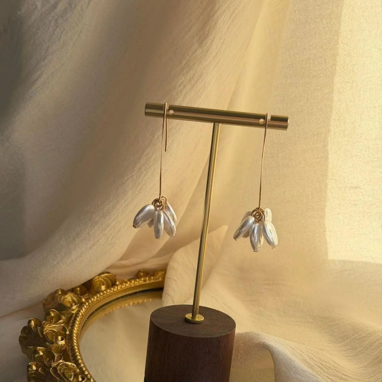 Clear Petal Cluster Drop Earrings Gold Tone Alloy — worn on model, side profile