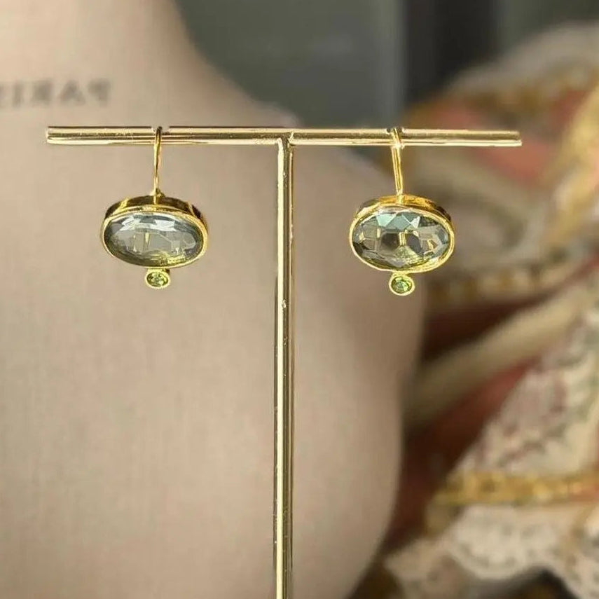 Grey Crystal & Green Accent Drop Earrings Gold — pair shown together on flat lay