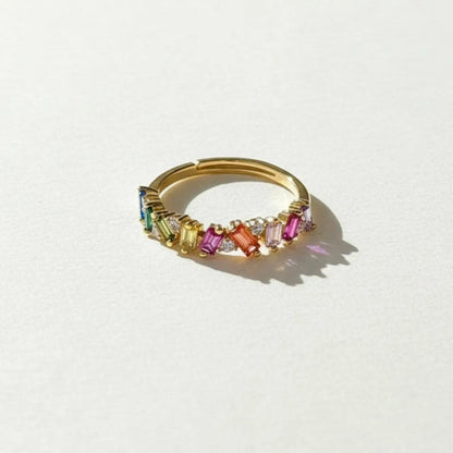 Rainbow Baguette Stone Eternity Ring Gold Women — styled flat lay
