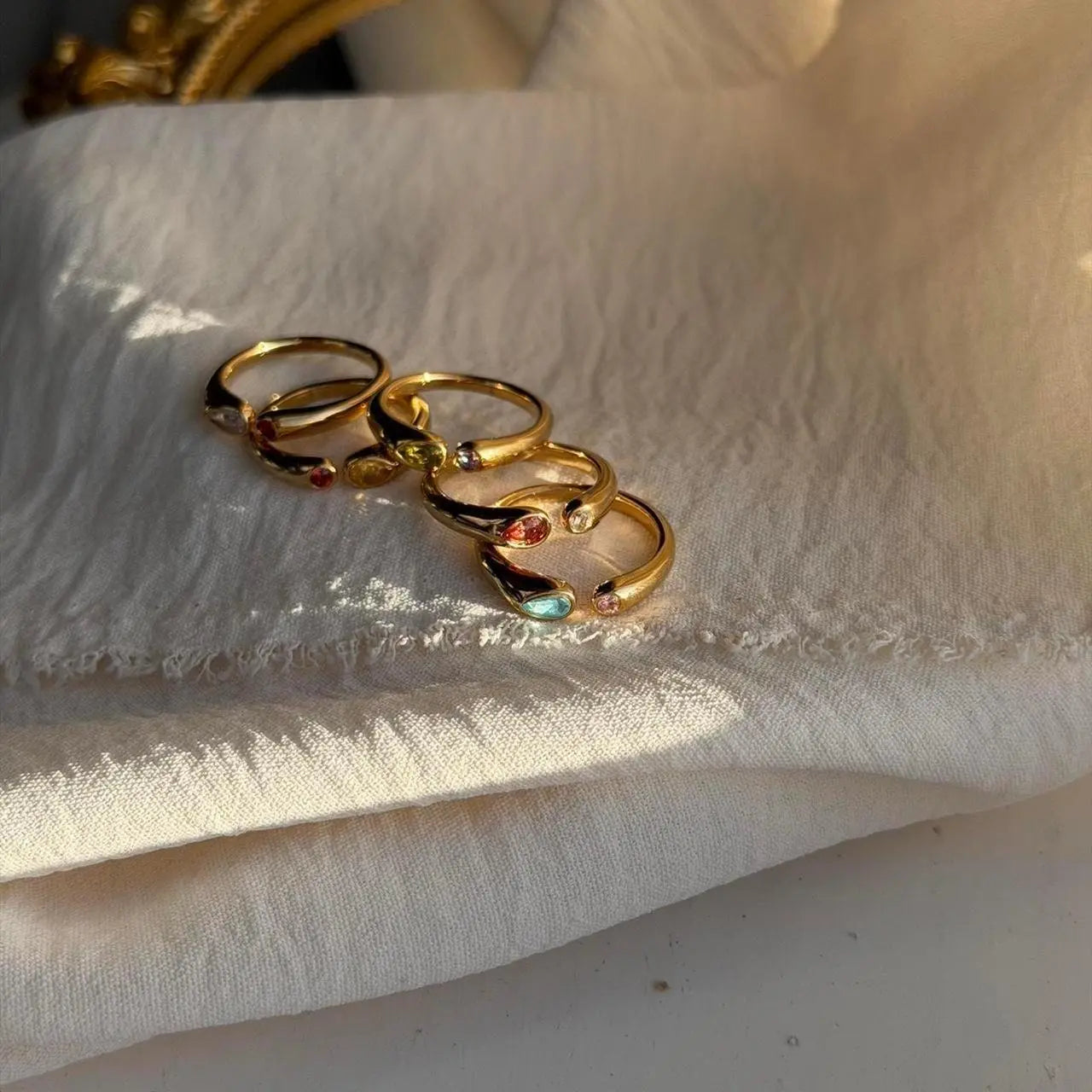 Dual Stone Toi et Moi Open Ring 18K Gold Clear Ruby — styled flat lay
