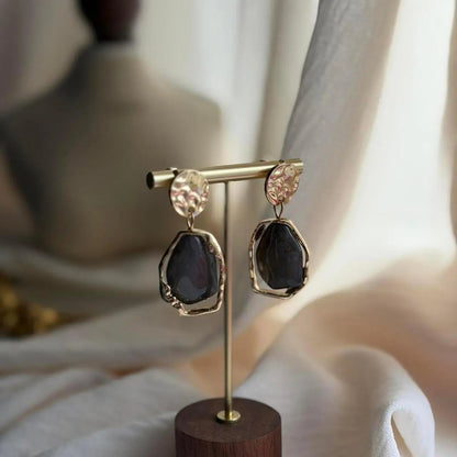 Smoky Grey Resin Drop Earrings S925 Gold Disc — worn on model, side profile