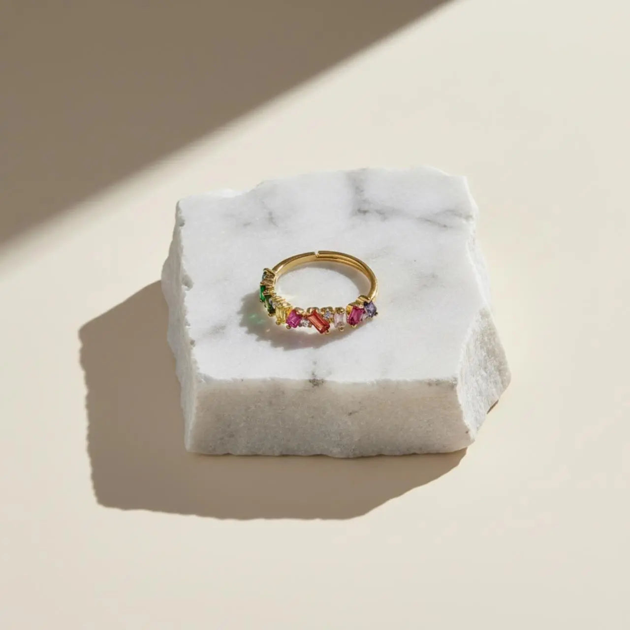 Rainbow Baguette Stone Eternity Ring Gold Women — worn on finger, angled view