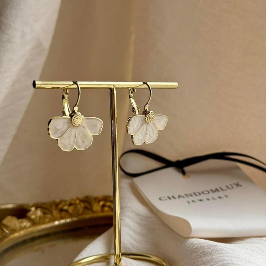 White Petal Flower Huggie Drop Earrings Gold Alloy on neutral background — front view