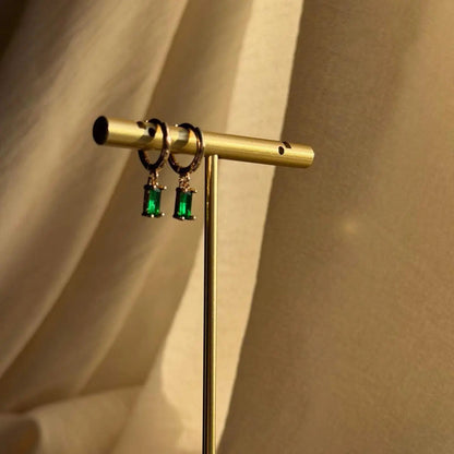 Emerald Baguette Crystal Huggie Hoop Earrings 14K — worn on model, side profile