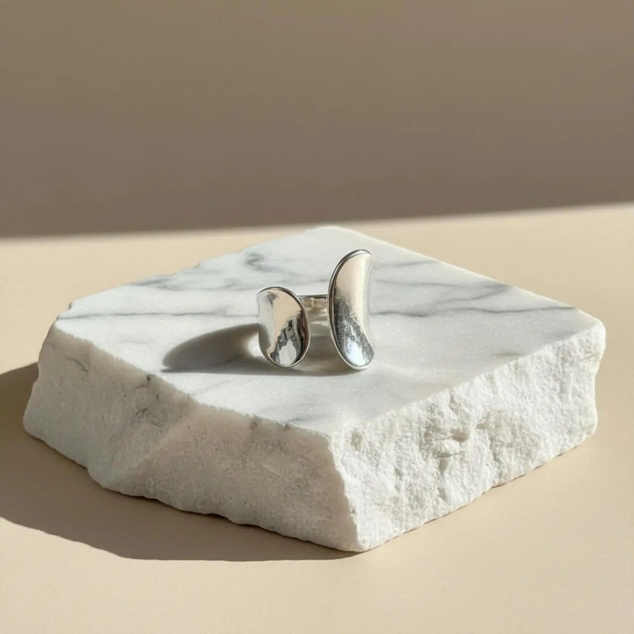 Sculptural Saddle Open Ring S925 Sterling Silver on neutral background — front view