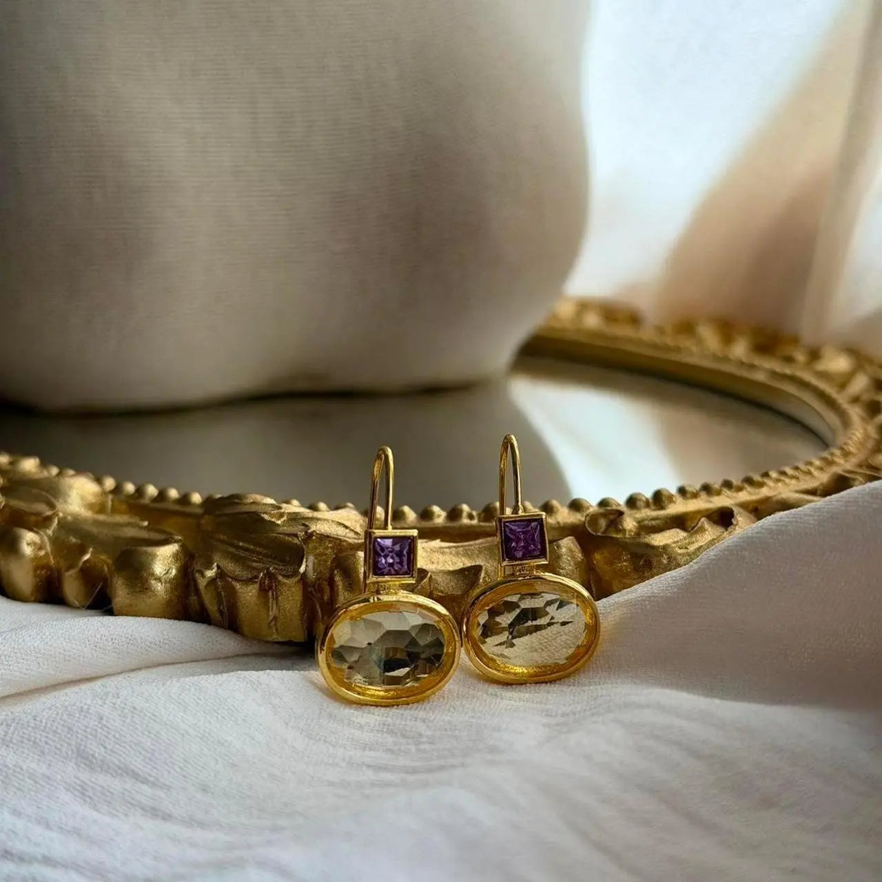 Amethyst & Crystal Square Drop Earrings Gold Tone — angle highlighting drop and movement