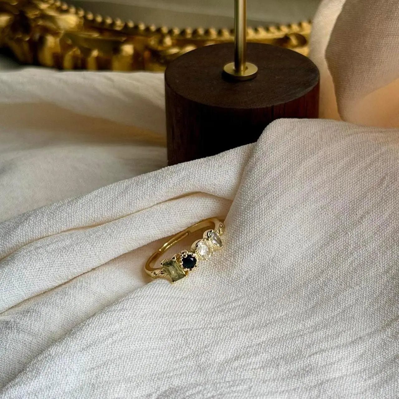 Minimalist Multi-Stone Cluster Ring Gold Adjustable — worn on finger, angled view