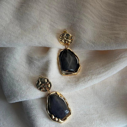 Smoky Grey Resin Drop Earrings S925 Gold Disc — angle highlighting drop and movement