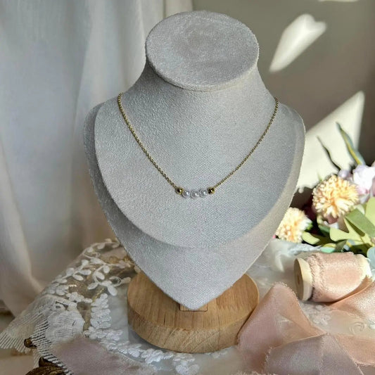 Dainty Pearl & Gold Bead Station Necklace Gold Tone on neutral background — full length view