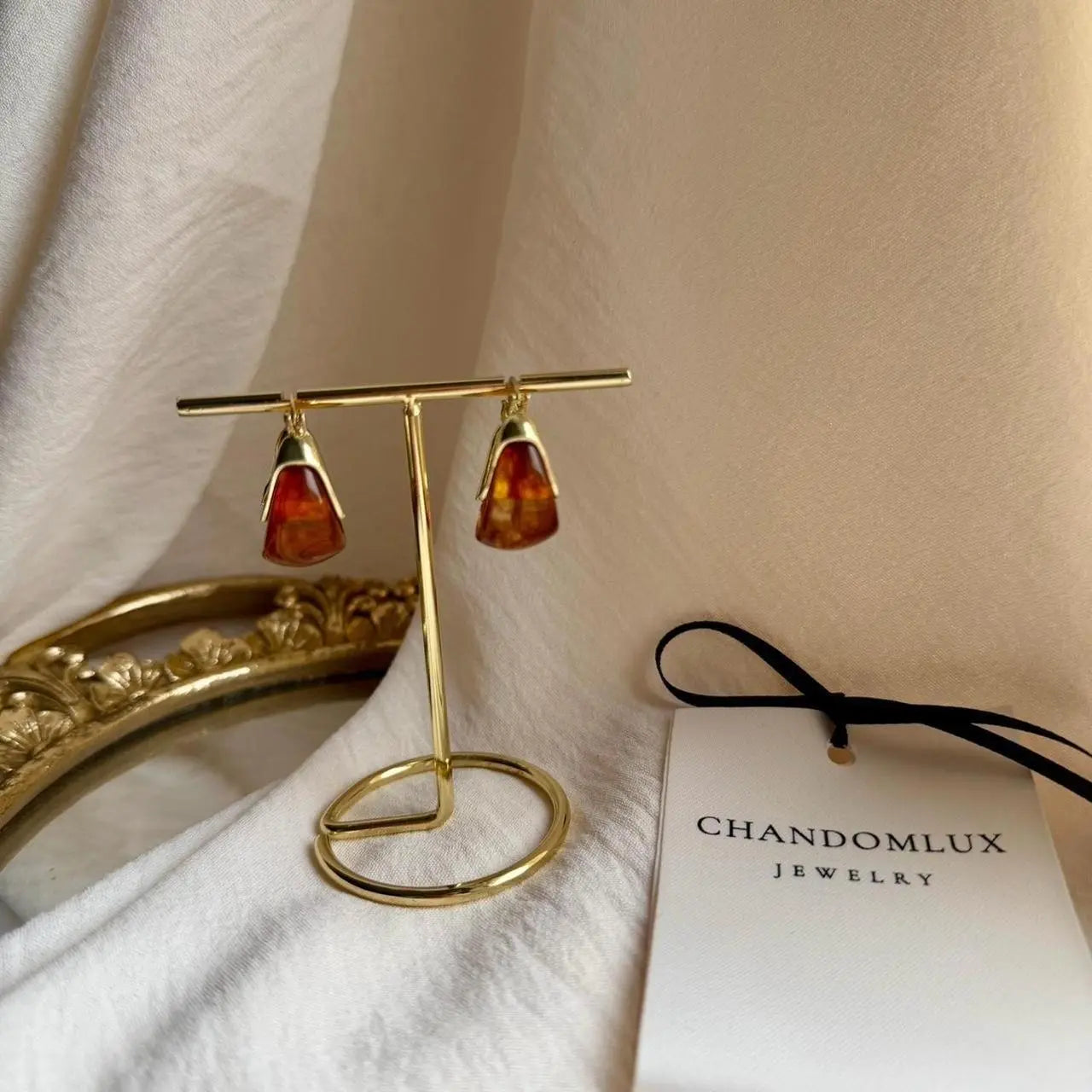 Amber Tortoiseshell Resin Chunky Hoop Drop Earrings — worn on model, side profile