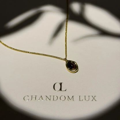 Natural Tiger Eye Oval Pendant Necklace Gold Plated — styled flat lay with textures