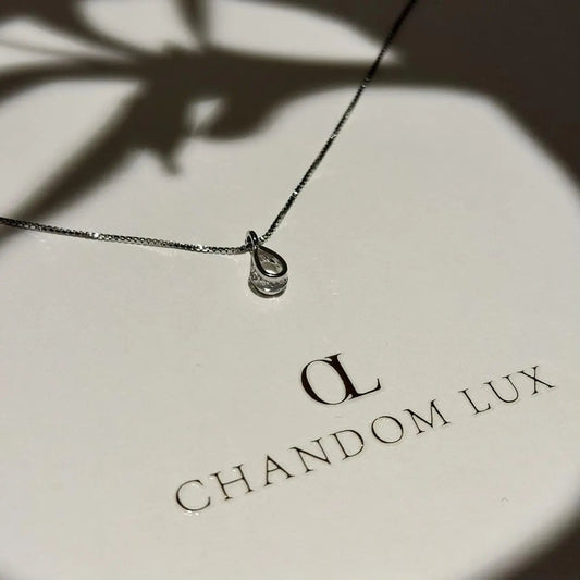 Clear Crystal Teardrop Pendant Necklace S925 Silver on neutral background — full length view