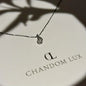 Clear Crystal Teardrop Pendant Necklace S925 Silver on neutral background — full length view
