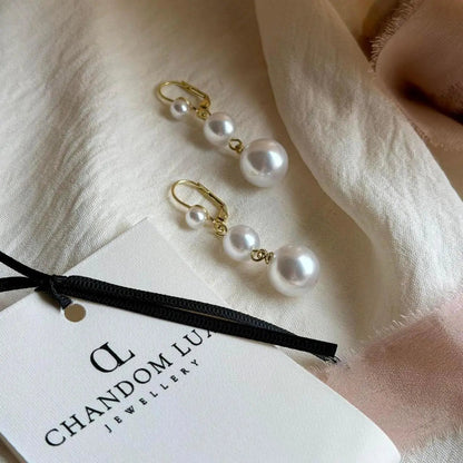 Triple Graduated Pearl Drop Earrings S925 Gold — pair shown together on flat lay