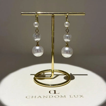 Triple Graduated Pearl Drop Earrings S925 Gold — close-up of pearl and post detail