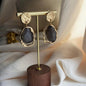 Smoky Grey Resin Drop Earrings S925 Gold Disc on neutral background — front view