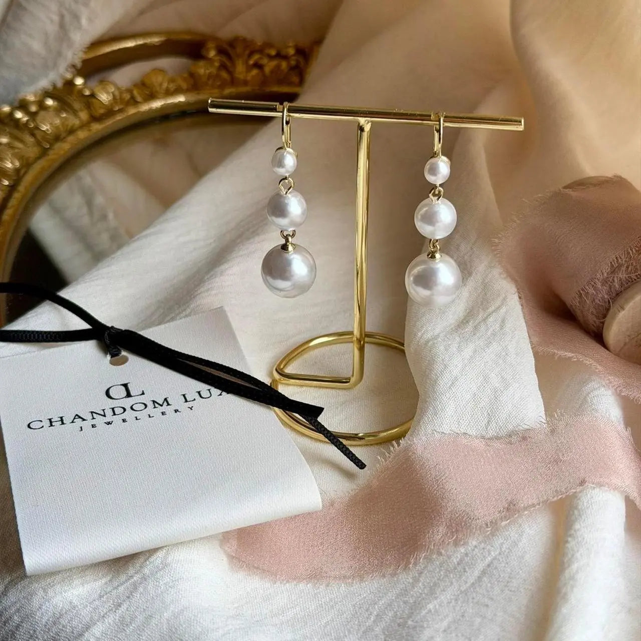 Triple Graduated Pearl Drop Earrings S925 Gold — worn on model, side profile