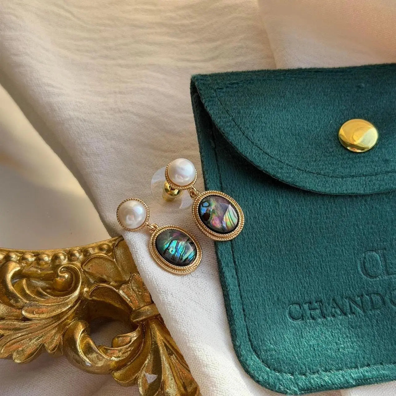 Abalone Shell & Freshwater Pearl Drop Earrings Gold — angle highlighting drop and movement