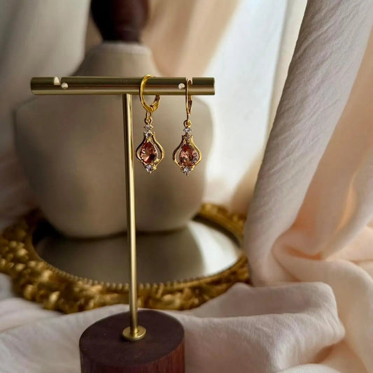 Peach Crystal Huggie Drop Earrings Gold Stainless on neutral background — front view