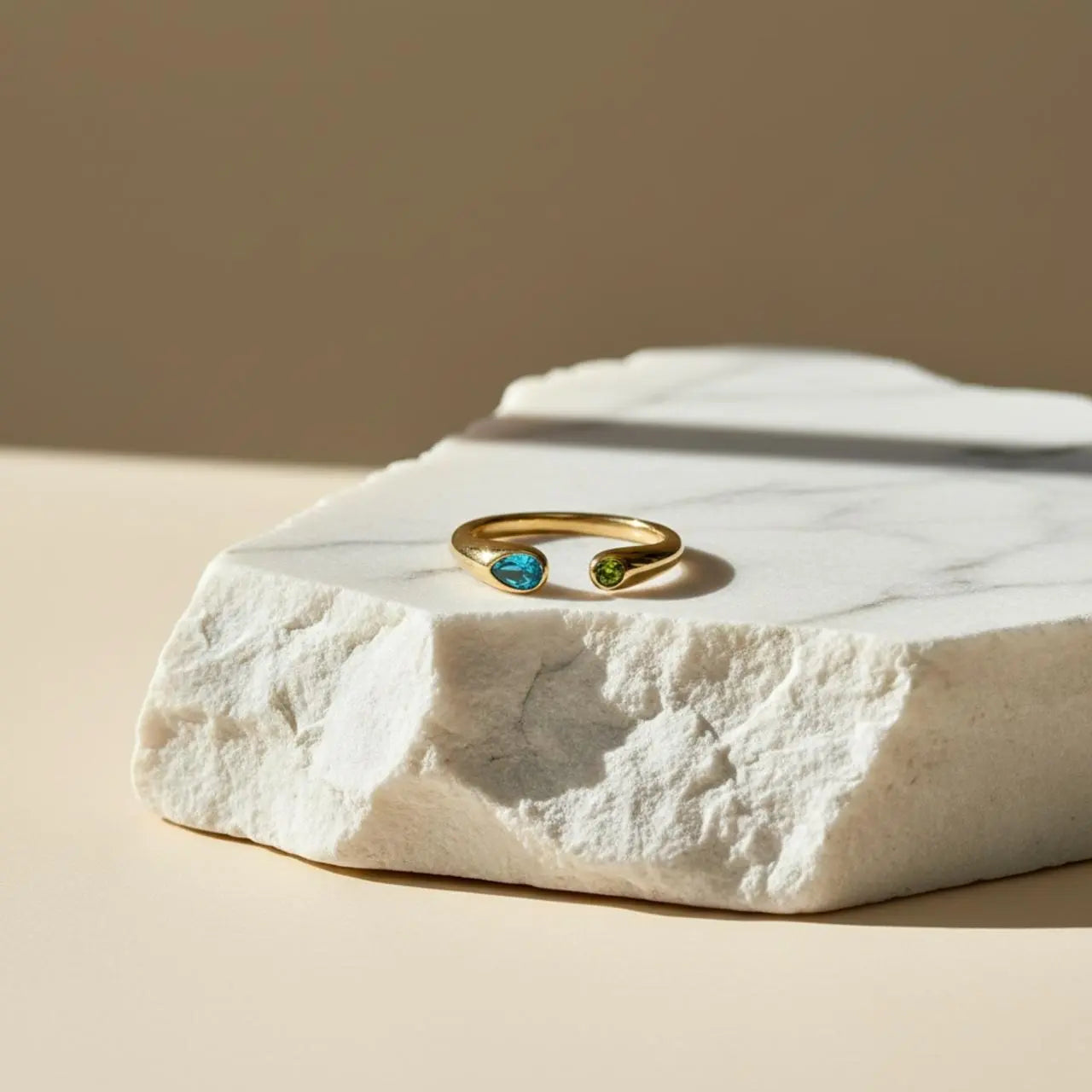 Teardrop Toi et Moi Open Ring 18K Gold Blue Green on neutral background — front view