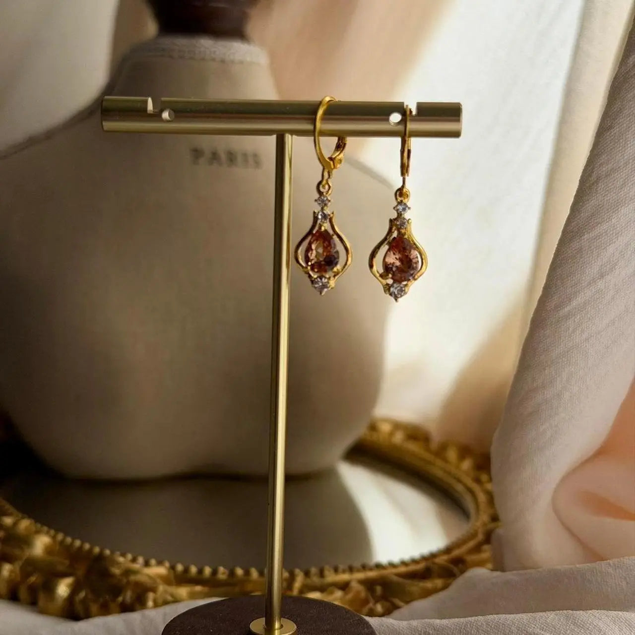 Peach Crystal Huggie Drop Earrings Gold Stainless — pair shown together on flat lay
