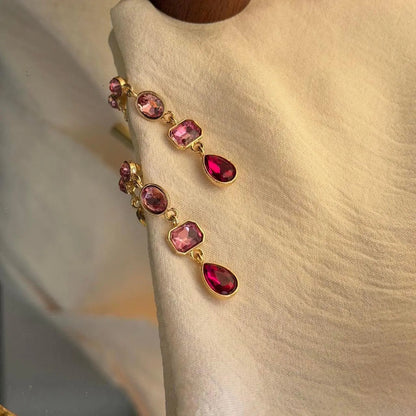 Pink Ombre Crystal Triple Cascade Drop Earrings Gold — worn on model, side profile