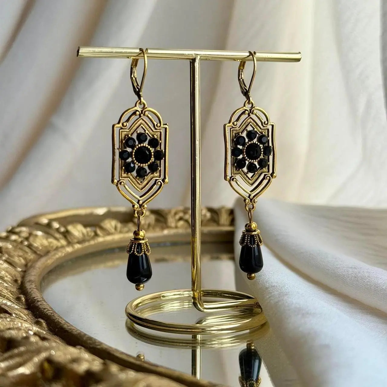 Art Deco Black Crystal Filigree Drop Earrings Gold — close-up of pearl and post detail