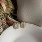 Tweed Crystal & Pearl Square Stud Earrings S925 Gold on neutral background — front view