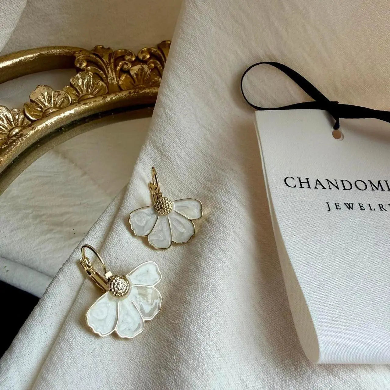 White Petal Flower Huggie Drop Earrings Gold Alloy — worn on model, side profile