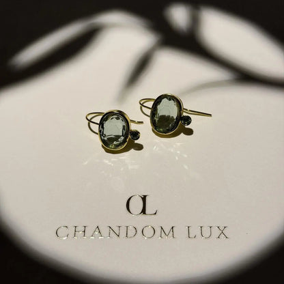 Grey Crystal & Green Accent Drop Earrings Gold — worn on model, side profile