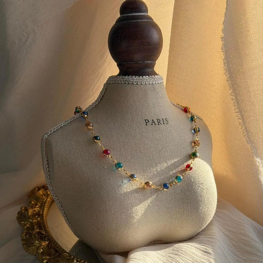 Multicolour Gemstone Bezel Station Necklace Gold on neutral background — full length view