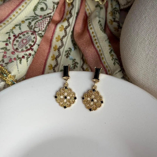 Gold Filigree Medallion Drop Earrings S925 Black on neutral background — front view