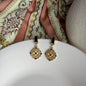 Gold Filigree Medallion Drop Earrings S925 Black on neutral background — front view