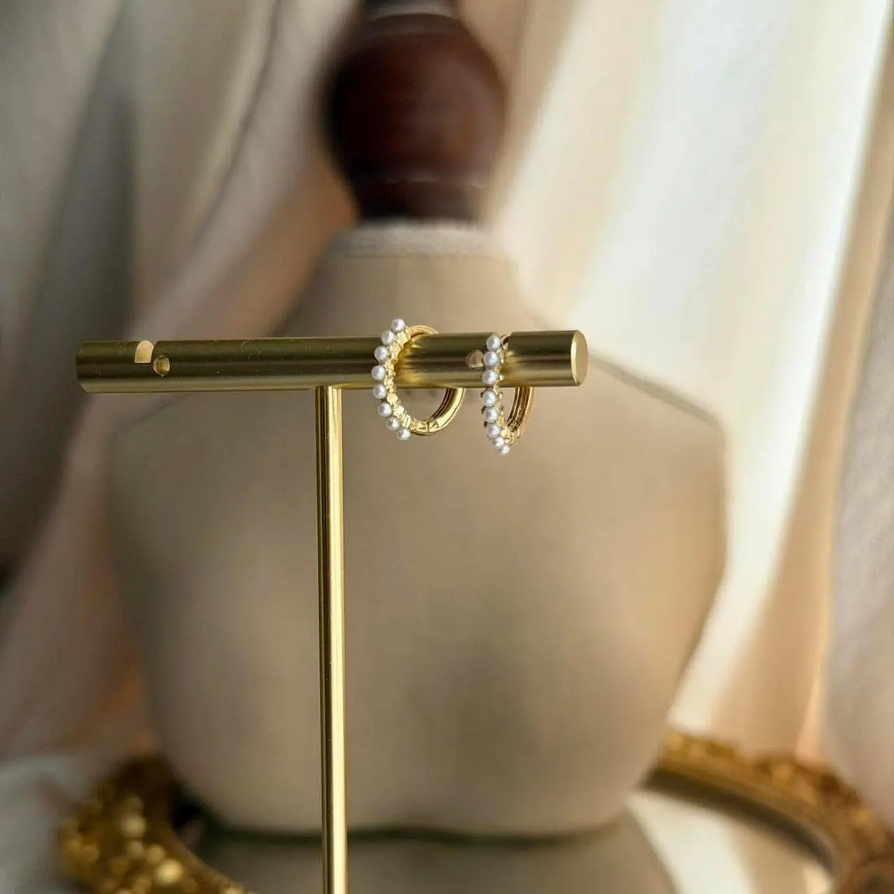 Mini Pearl Studded Huggie Hoop Earrings S925 Gold — close-up of pearl and post detail