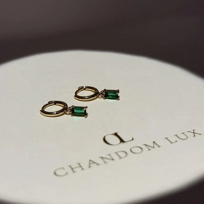Emerald Baguette Crystal Huggie Hoop Earrings 14K — close-up of pearl and post detail